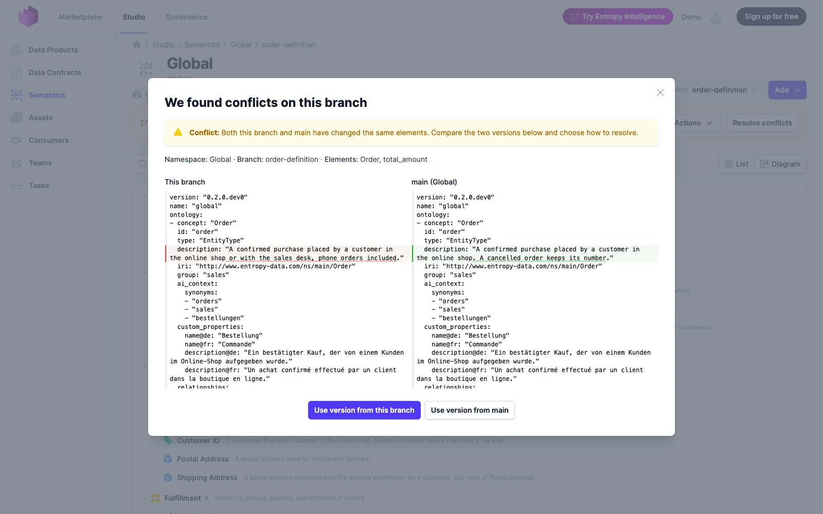 Resolving a conflict: the branch's version and main's side by side, one decision for the branch